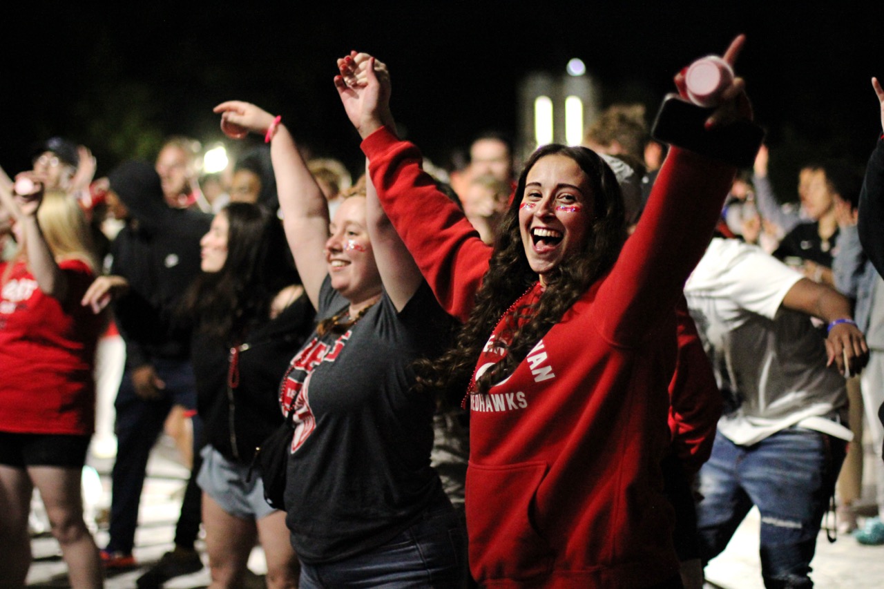 Female student celebrating at a student life event