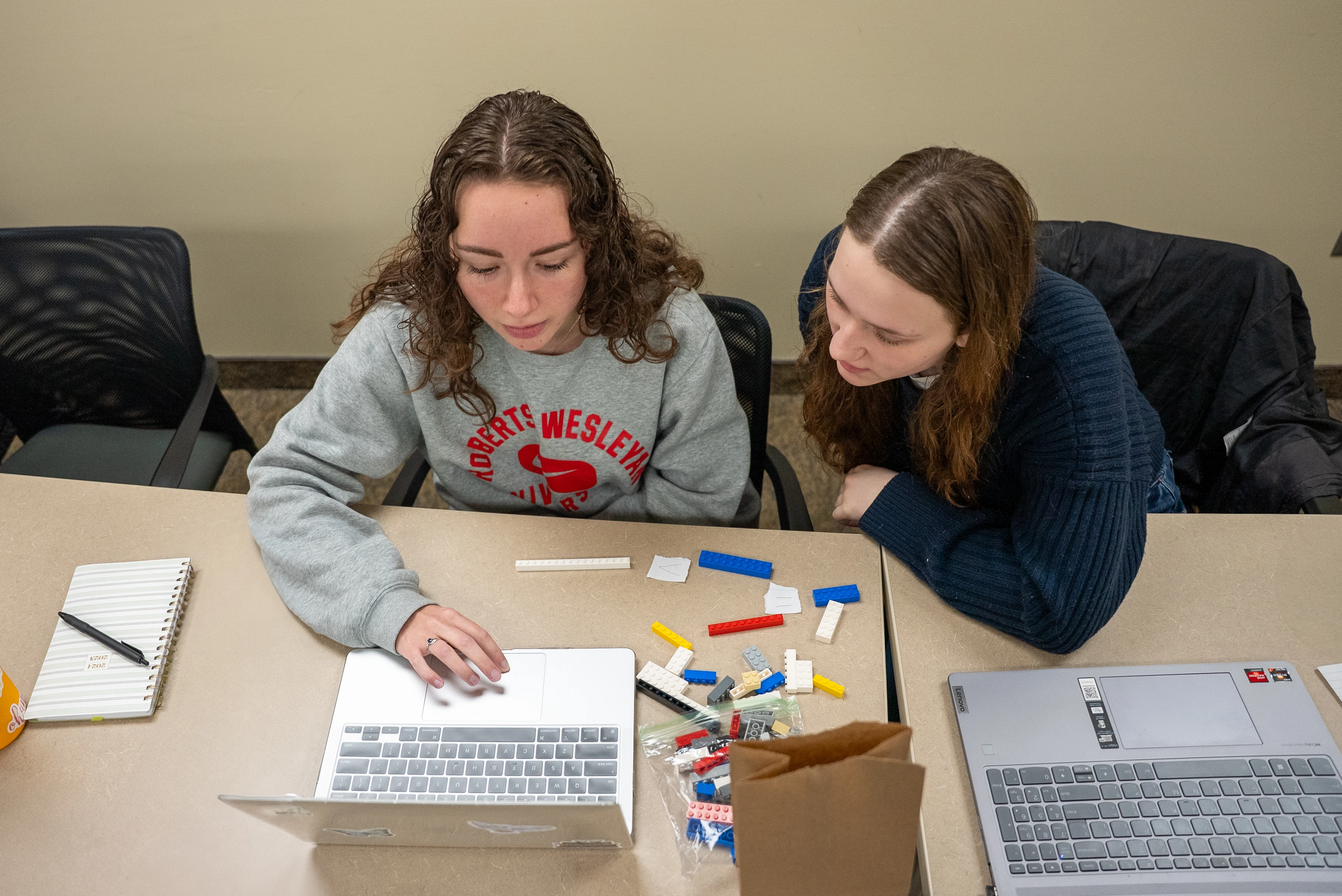 Two Female Students Studying Together