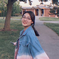 A young woman smiles